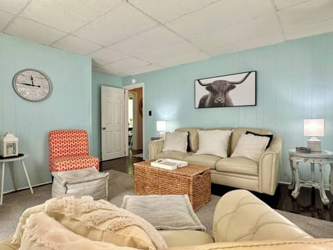 Sneak peek of our bright living area! Update for Summer 2026: This space is being upgraded with a brand-new, comfortable queen sleeper sofa to accommodate a total of 4 guests! 