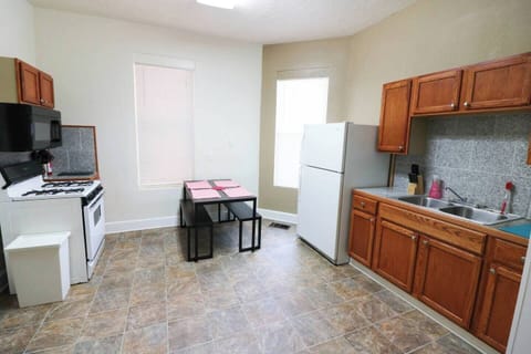 Enjoy this spacious kitchen in Indianapolis with modern appliances and plenty of room to cook and dine—great for guests who enjoy making their own meals.