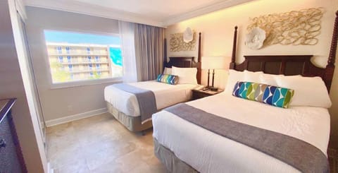 Unit with 2 Double size beds. Exact unit will be assigned upon arrival. Views, colors and decor may vary.