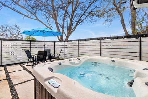 Our fenced backyard gives you privacy to enjoy our hot tub 
