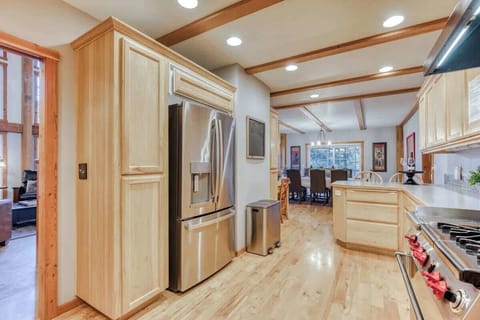 Whip up culinary delights in the modern kitchen, with stainless steel appliances and a functional layout.