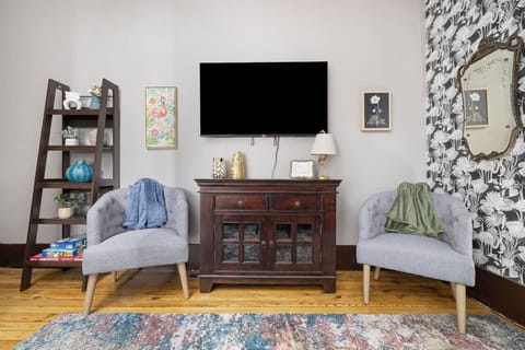 Relax in style with comfortable seating and thoughtful decor.