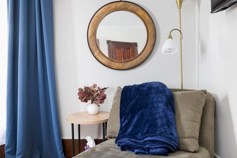 This beautifully styled bedroom combines comfort with charm, offering a perfect escape after a day of exploring.