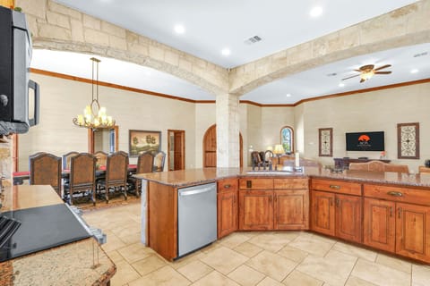 Beautiful stone archways line the kitchen