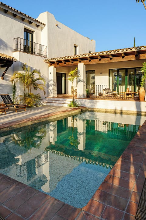 Pool and decking from the far side of the pool