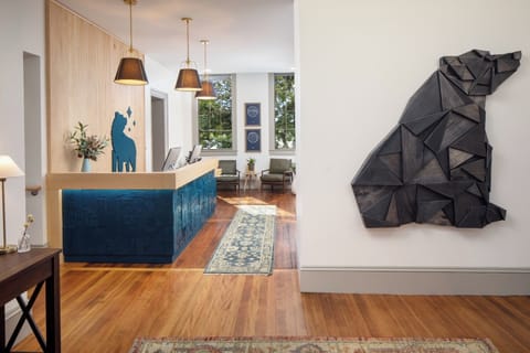 Arrive to a stylish lobby with warm light and artful charm.