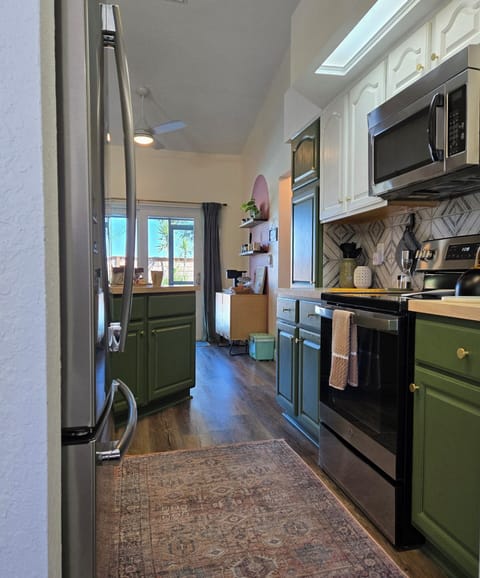 Cooking appliances including 4 slice toaster, blender, drip coffee maker, keurig, and crock pot.