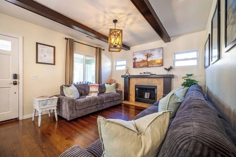 Relax in a cozy living room with soft sofa, warm lighting, and calm ambiance.