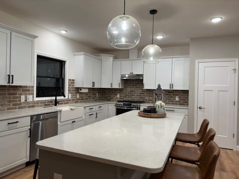 Kitchen including crockpot, kitchen mixer, toaster, blender