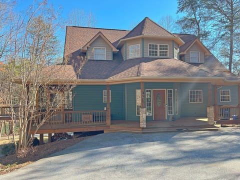 The Front Entry and Parking Area make access easy, with just one step up to from Parking to the Main Level.  Ample parking for 3+ vehicles.