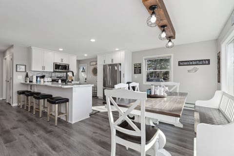 Open concept kitchen and dining room makes for easy conversations.