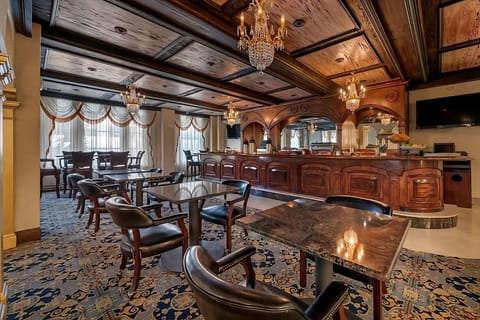 Gather for relaxed conversation in this warm, wood-finished lounge.
