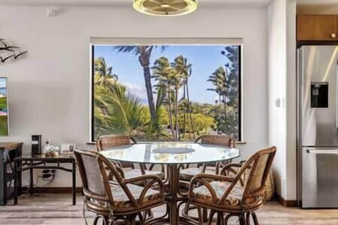 Dining table for four people with blade-less fan