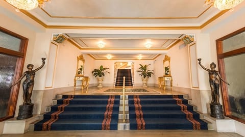 Climb the dramatic staircase and feel old-world elegance surround you.