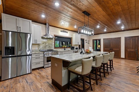 The large eat-in island has bar seats and plenty of room for everyone to join in on the kitchen conversation and cooking.