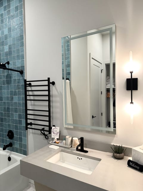 Spacious Sink Area & Towel Warmer