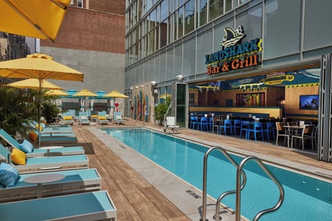 Unwind poolside with tropical cocktails steps from your lounger.