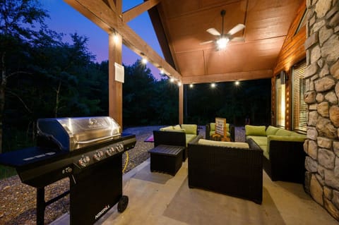 "Relax, unwind, and grill in the glow of the cabin