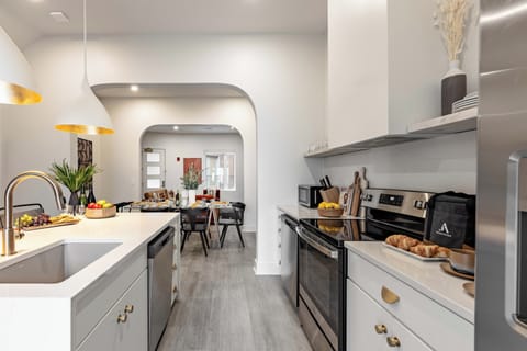 Stainless steel appliances in the kitchen.