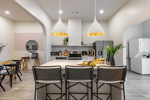 Barstool seating at the kitchen island.