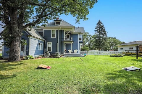 Very large backyard with games and firepit and BBQ