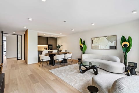 Modern meets comfort in our open-plan living space, ideal for relaxation and entertainment.