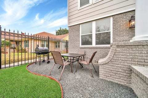 On site front patio, where a patio table and charcoal grill await. Prefer gas grilling? No worries, we`ve got you covered with an on-site option. It`s your spot for outdoor grilling, promising a delightful stay from the moment you arrive.