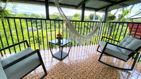 Big balcony with scenic green views. Refreshing and great for sunsets 