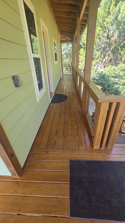 Back door on left, wrap around porch 