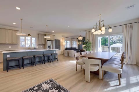 Open concept kitchen, dining room and living room