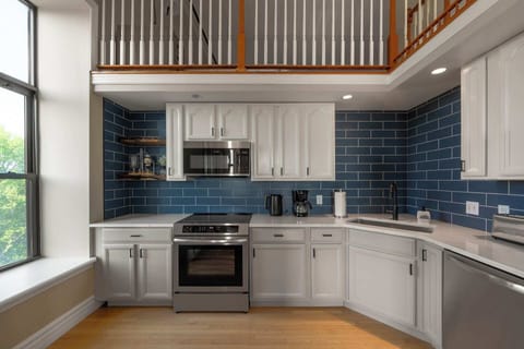 Modern kitchen with stainless steel appliances