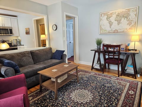 Living room - Includes full-size pullout sofa bed with 6" memory foam mattress.