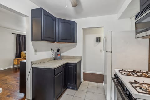 Indoors, Floor, Flooring, Kitchen, Cooktop