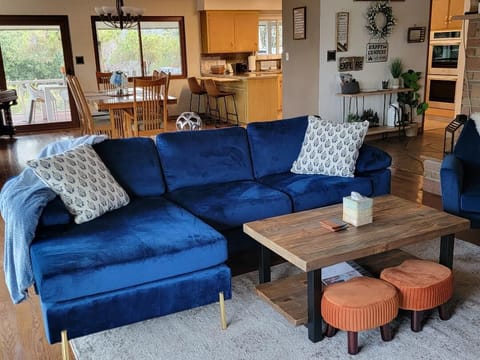 New couch and side chairs to watch to new 75 inch TV