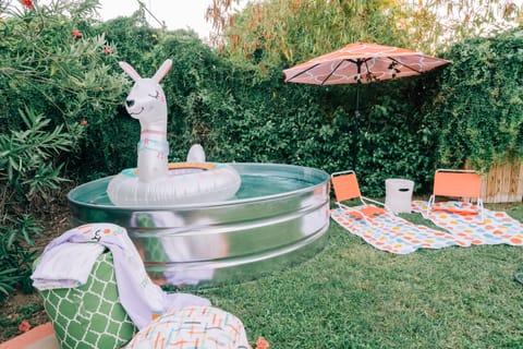Backyard 8 ft stock tank pool with lounge and fun accessories!
