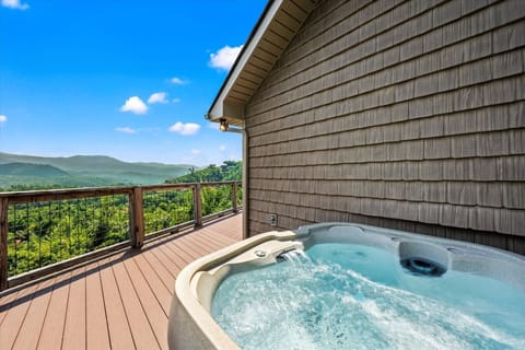 Sink into the hot tub and watch the layers of blue mountains fade into the distance. Morning coffee or evening stargazing, this is relaxation with a front-row view.