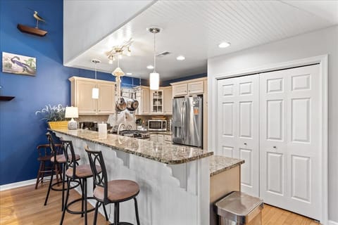 Chef's Kitchen with Granite Countertops and Stainless Appliances.