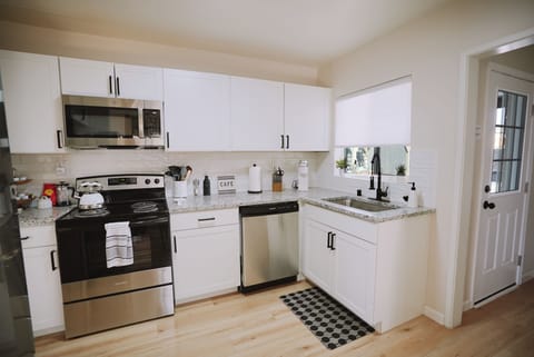 Graciously stocked kitchen ready for any meal or snack prep