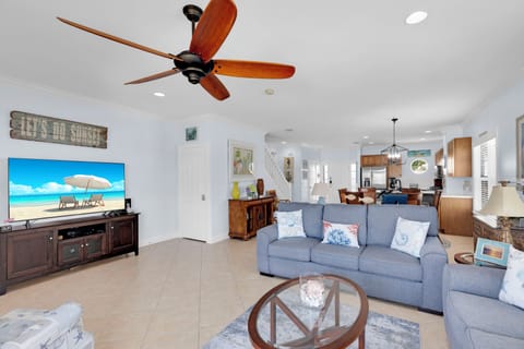 Living room w/ 65" smart tv.