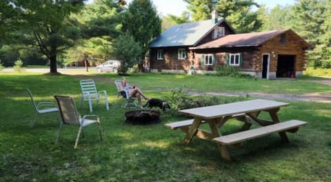 Picnic table and fire pit with plenty of seating!