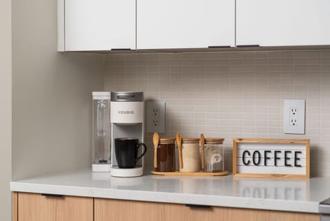 Keurig coffee maker. We provide local coffee from Honest coffeeshop, sugar and tea