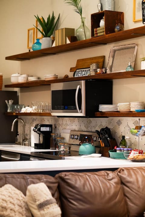 Fully stocked kitchen—coffee, tea, snacks, and everything you need to cook or chill.