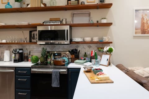 olive oil, spices, pots, pans, knives, cutting boards, strainers, all provided.