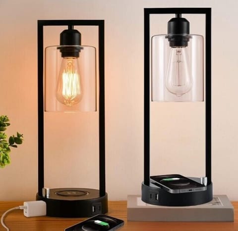 Bedside lamp with built-in phone charging for convenience and easy nighttime access.