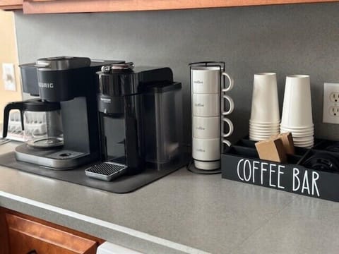 Enjoy your morning brew your way with Nespresso, Keurig, and traditional drip coffee makers—all available in the kitchen!
