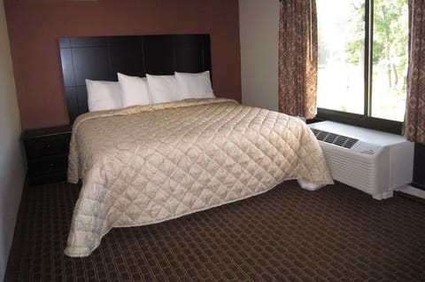Wake up to soft daylight in a crisp, cozy bed.