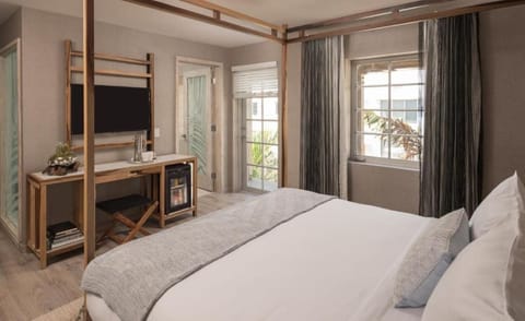 Settle in comfortably with workspace, minibar, and easy room flow