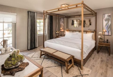 Sink into a luxurious canopy bed for deep, quiet sleep.