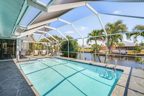 Cape Coral Vacation Rental | 4BR | 3BA | 2,204 Sq Ft | 1 Minor Step to Enter
