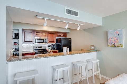 Bar stools line the bar at the kitchen.